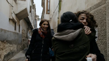 Under the Sky of Damascus film trailer button